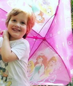 boy-with-disney-umbrella-child-with-autism