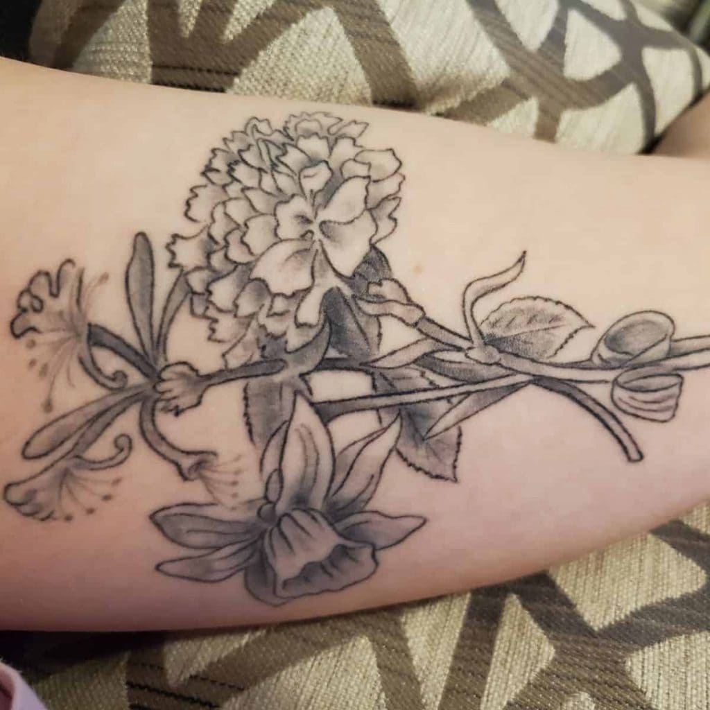 bouquet flower tattoo that represents miscarriage