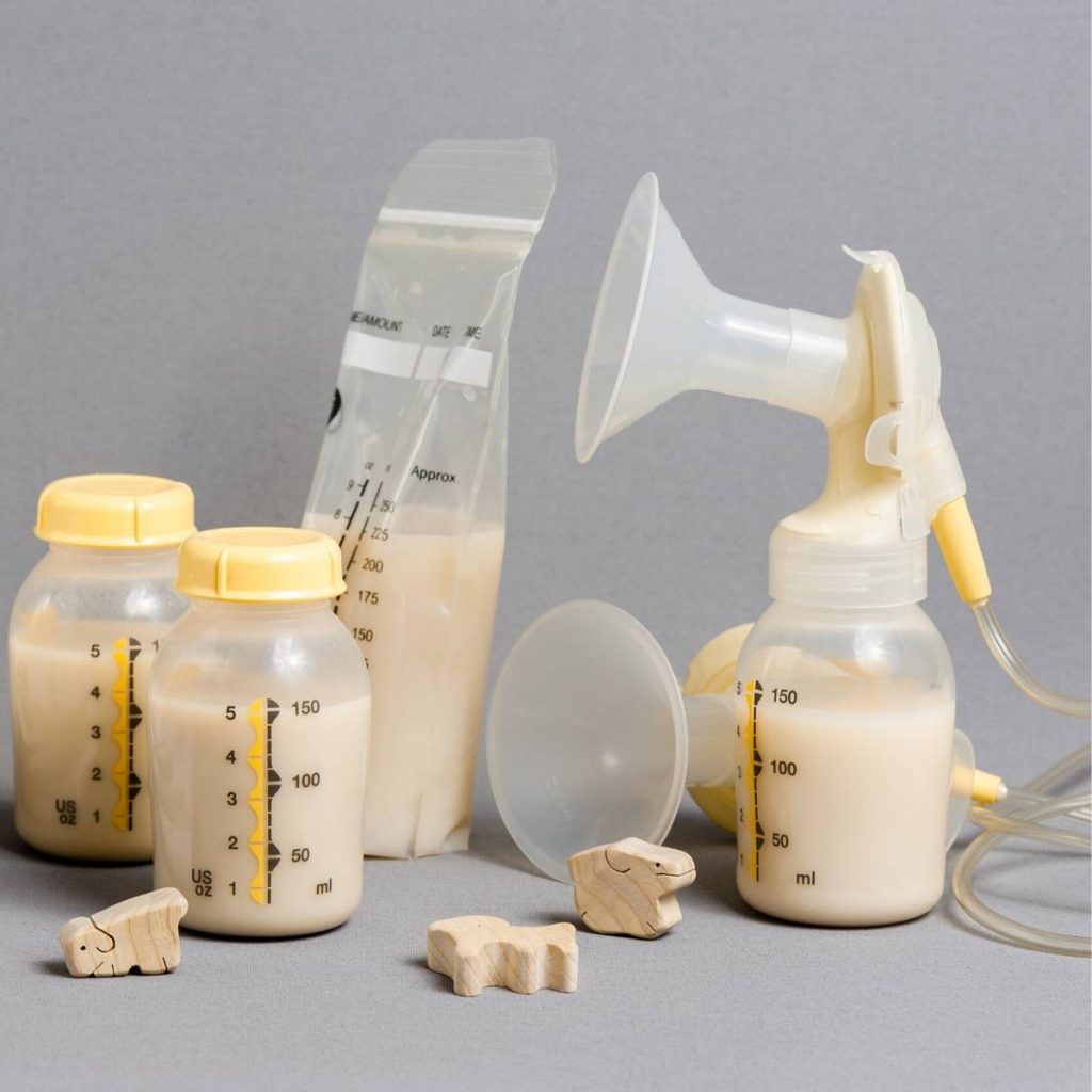 breast milk supply in bottles with a handheld manual medela breast pump