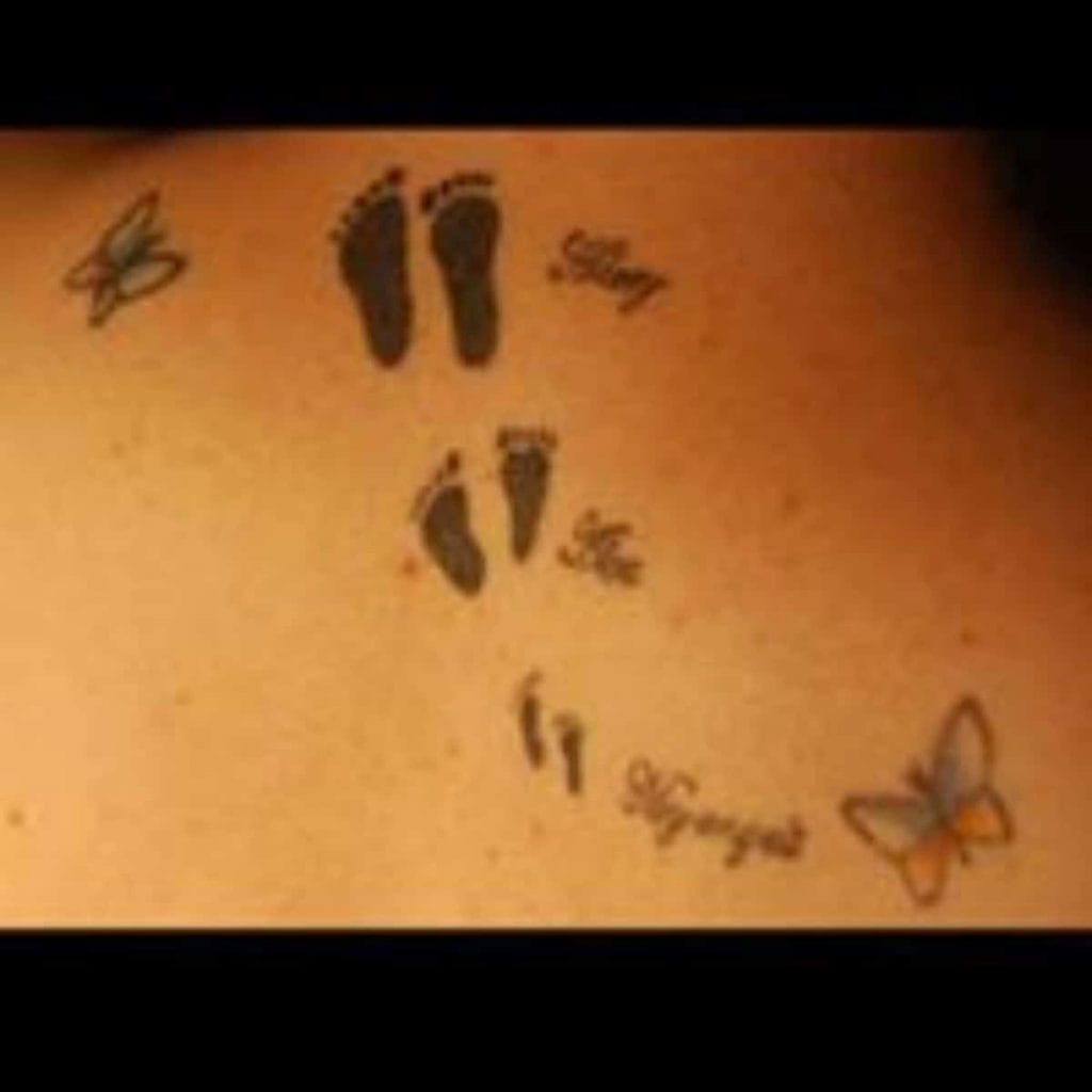 tattoo of baby footprints that represent stillbirth and miscarriage