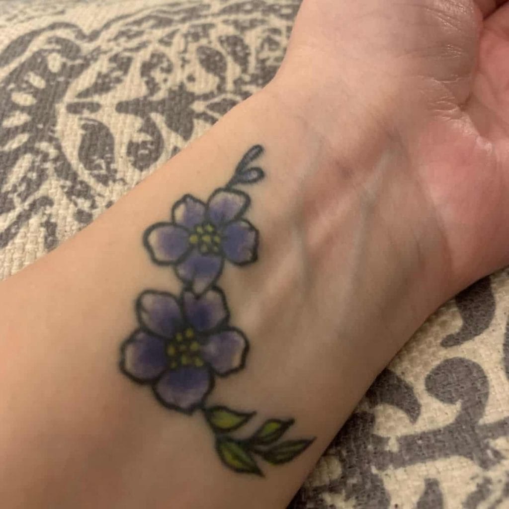 forget-me-not flower tattoo to memorialize miscarriage