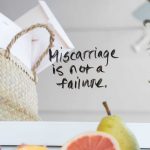 photo of fruit and a basket with text that reads "miscarriage is not a failture."