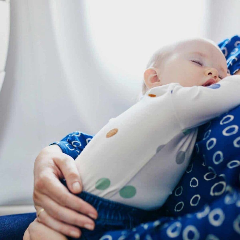 Napping baby on a plane