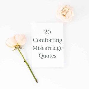 soft flowers with paper in the middle that says 20 comforting miscarriage quotes