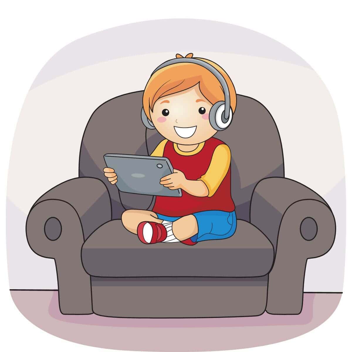 A square graphic image of a young boy with orange hair smiling while sitting on a gray easy chair watching a tablet and wearing headphones