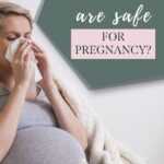 Pinterest pin that shows a pregnant woman blowing her nose. She has a cup of hot tea between her legs. Text says, "What cold medicines are safe for pregnancy?"
